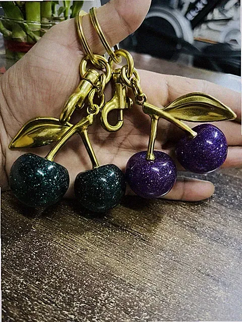 2 Pic Cute Coach Cherry Bag Charm KeyChain Glitter resin and Brass. Gift For Her