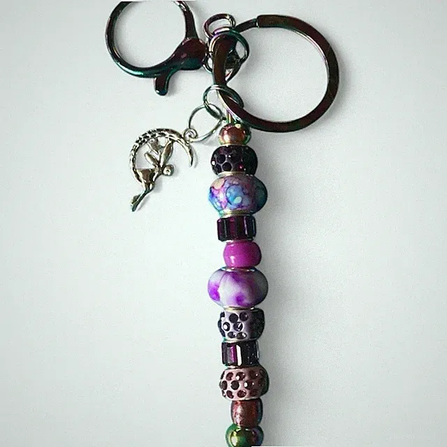 Awesome PURSE CHARM....PURPLES!!!!
