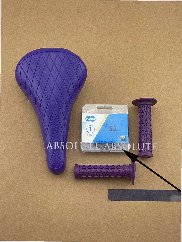PURPLE DIAMOND STITCHED BMX BIKE SADDLE W/ BMX KMC CHAIN &TRIANGLE STYLE GRIPS.
